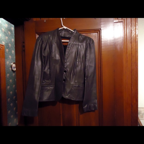 Ladies dark gray leather jacket. Junior size
