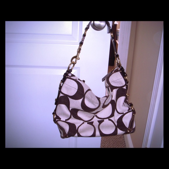 Very gently used canvas and leather Coach bag!