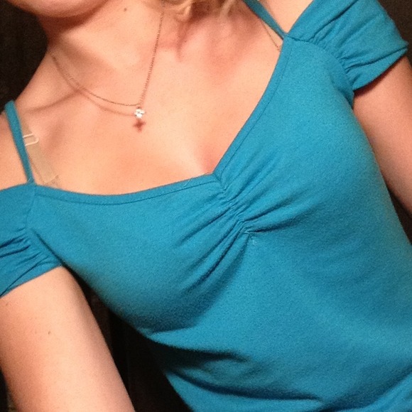 Cute blue shirt with cut out shoulders