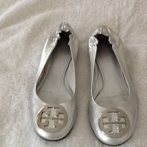 Silver Tory Burch Reva flats.