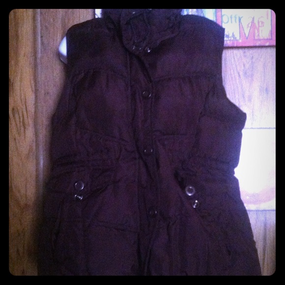 Thick brown vest.