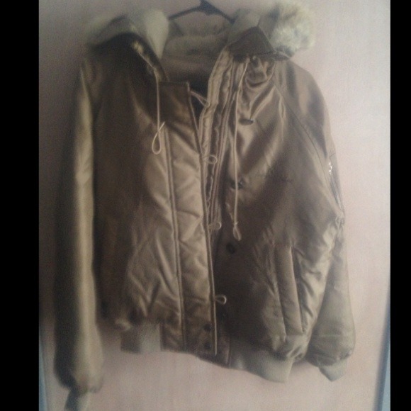 Tan colored baby phat heavy jacket size SM