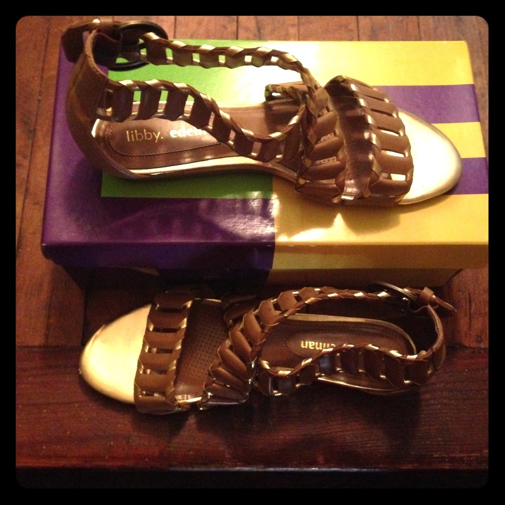 Libby. Edelman gladiator sandals in tan and gold.