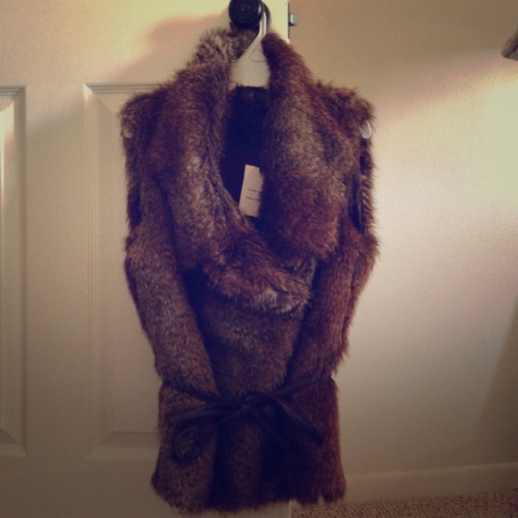 Guess faux fur vest. New with tags. Never worn