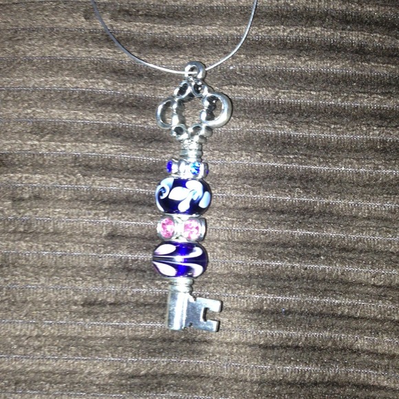 Murano bead necklace with key pendant.