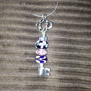 Murano bead necklace with key pendant.