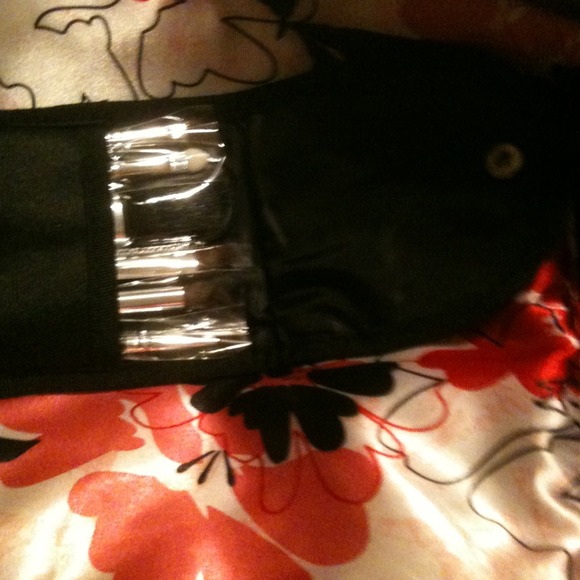 Makeup brushes in snap pocket