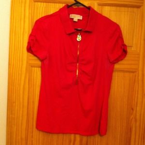 Fuschia colored Michael Kors zip up polo