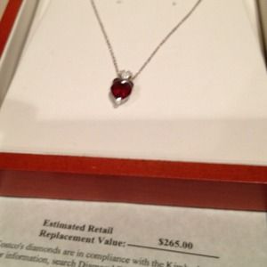 14kt white gold, garnet and diamond heart pendant