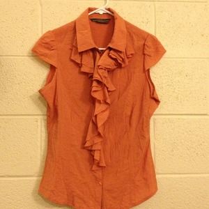 Max light orange shirt.