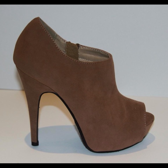 Brand new-never worn. Women's peep toe ankle boot.