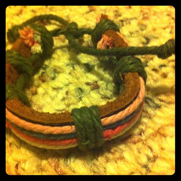 Textiles bracelet in soft pastel colors