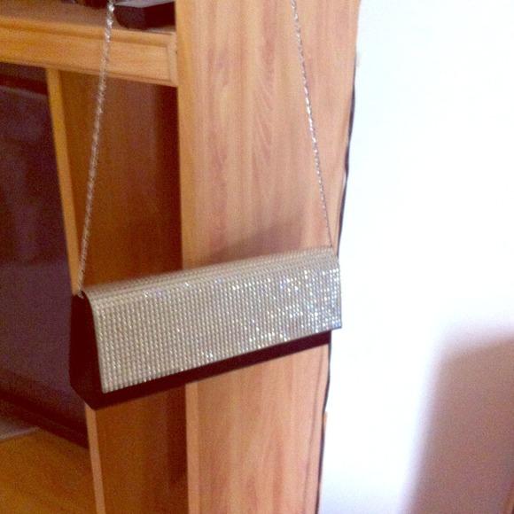 Satin and rhinestone clutch with chain.