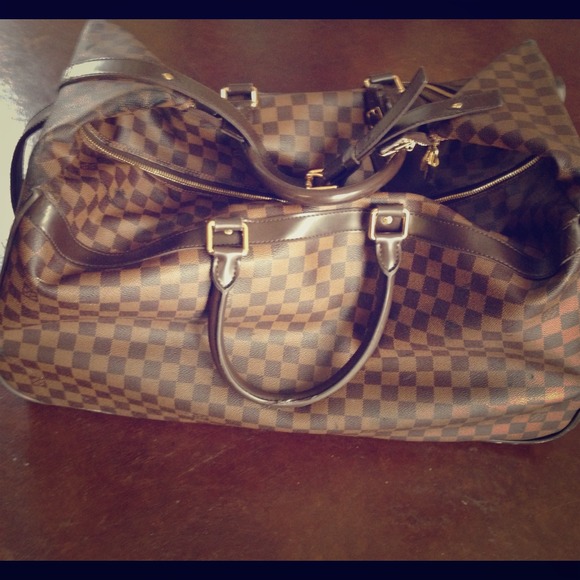 Auth Louis Vuitton Eole 60 suitcase.