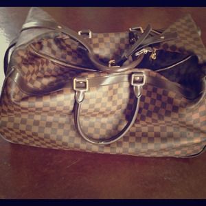 Auth Louis Vuitton Eole 60 suitcase.