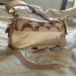 Gold coach handbag
