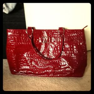 Large red handbag. 18"x12" in size. Like New.