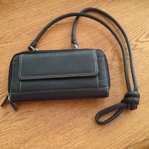 * *  SOLD  ** Tig Brown leather wristlet