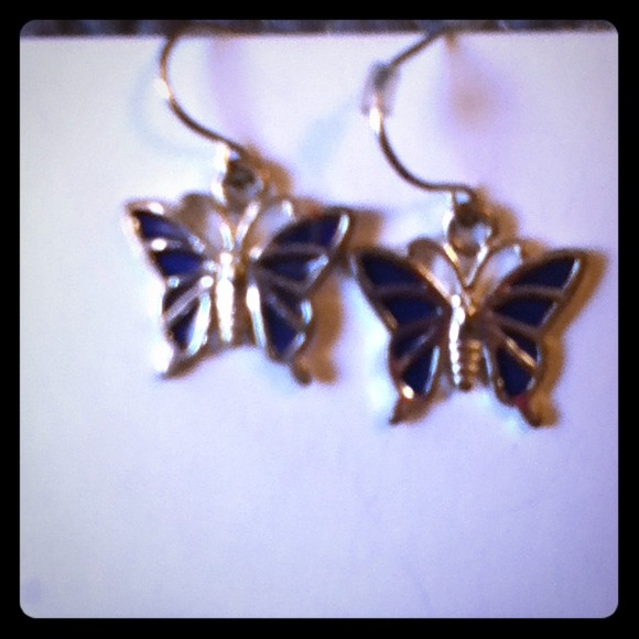 Two pairs of kids (or not) butterfly earrings.