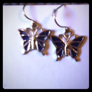 Two pairs of kids (or not) butterfly earrings.