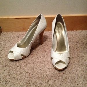 Nine West textured white high heels.