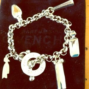 Givenchy limited edition silver charm parfums.