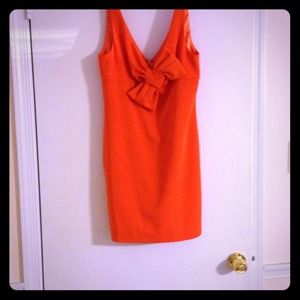 ABS Front Bow tie mini dress in tangerine.