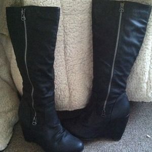 Tall wedge black boots