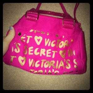 Bright pink Victoria's Secret round purse