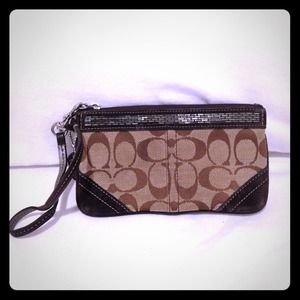 *Traded* Authentic brown coach wristlet.