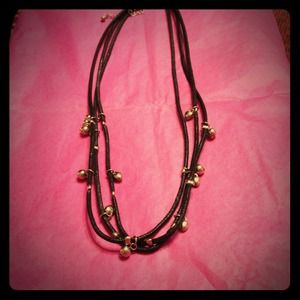 Leather and silver accent necklace