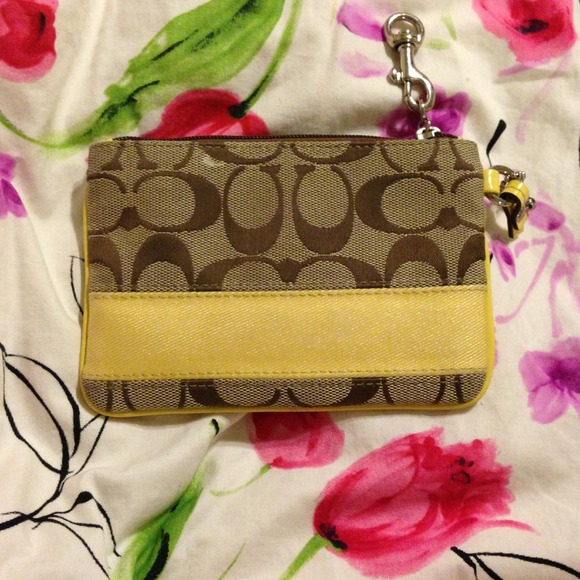 Sold. Coach Signature yellow mini