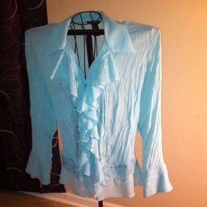 Very nice blue blouse.