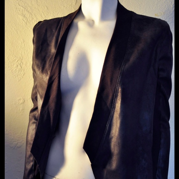 Edgy rubberized jacket by velvet