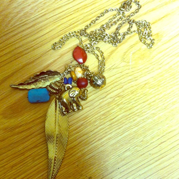 Elephant necklace. Gold chain.