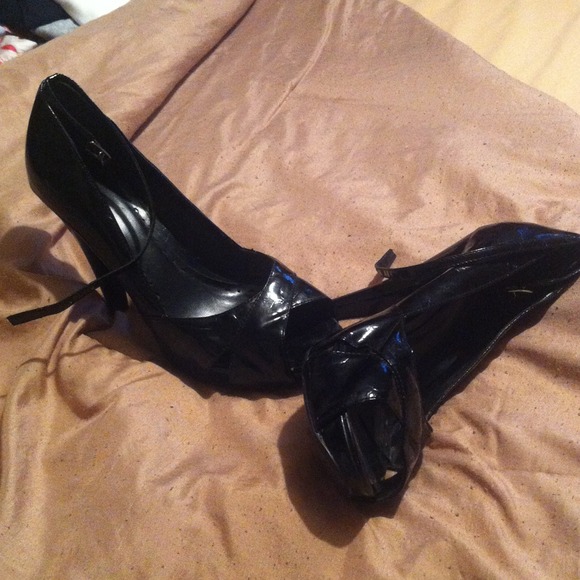 Black patent leather peep toe heels