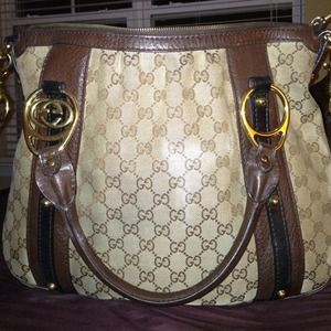 Large sized gucci handbag with messenger strap