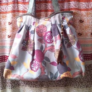 Large floral tote with tassel.