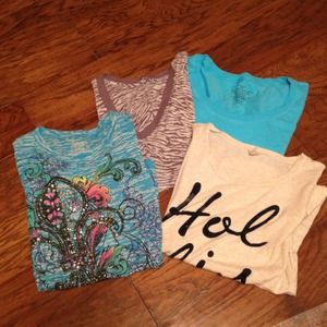 :::: Sold ::::: A bundle of 4 shirts