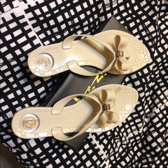 Beige jelly flip flops size 9