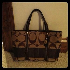 Coach signature collection purse.