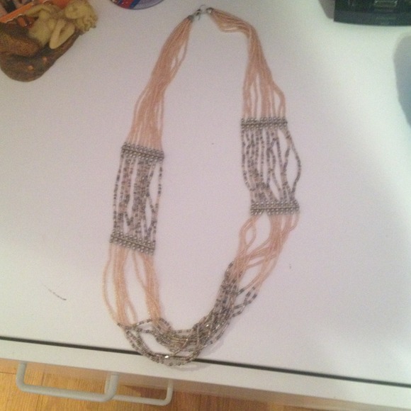 Long beaded pink and gold necklace