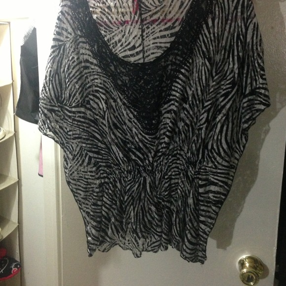 REDUCED: Sheer zebra top with a lace accent - Picture 1 of 2