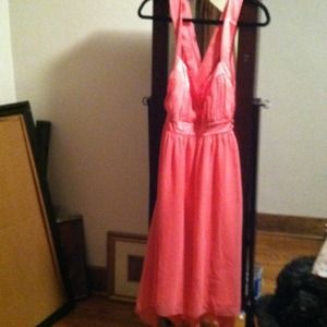 SOLD.     Brand new salmon colored party wear.