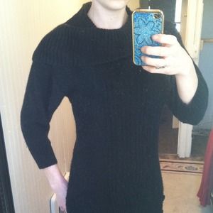 Black loose turtleneck sweater with buttons