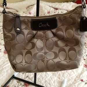 Small coach with long strap