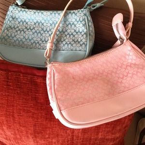 2 coach Small hand purse.
