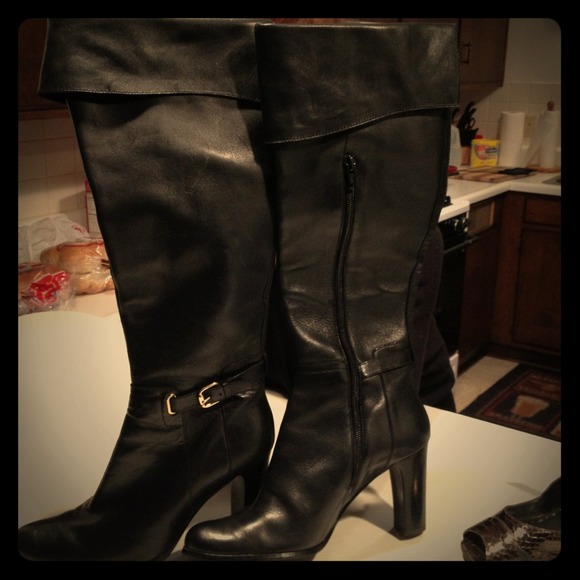 Knee Highblack cuff boots with gold buckle detail
