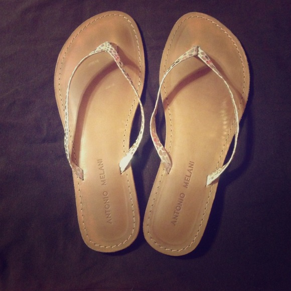 SOLD!!!  Adorable gold flip flops