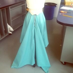 high waisted teal skirt with a high low hem